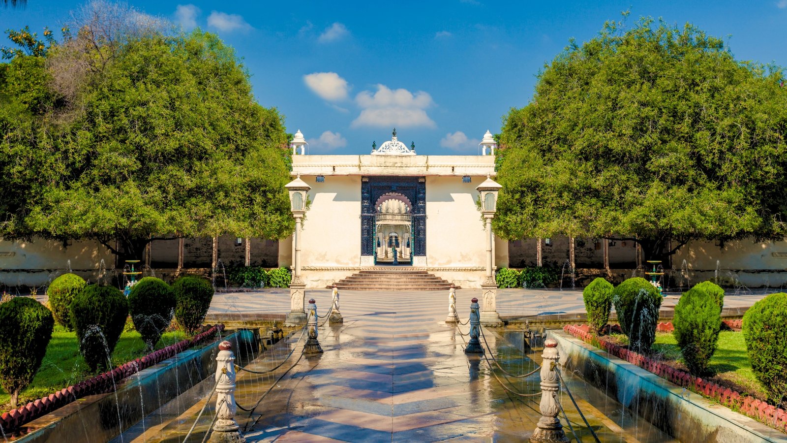 Bahubali Hills near Badi Lake in Udaipur, offering panoramic views of the Aravalli ranges and tranquil waters at sunrise